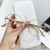 المعادن جولة ديكور نظارات دائرية النساء مكافحة الضوء الأزرق نظارات الكمبيوتر إطار مشهد معدني أسود 0 الديوبتر 2024 نظارات